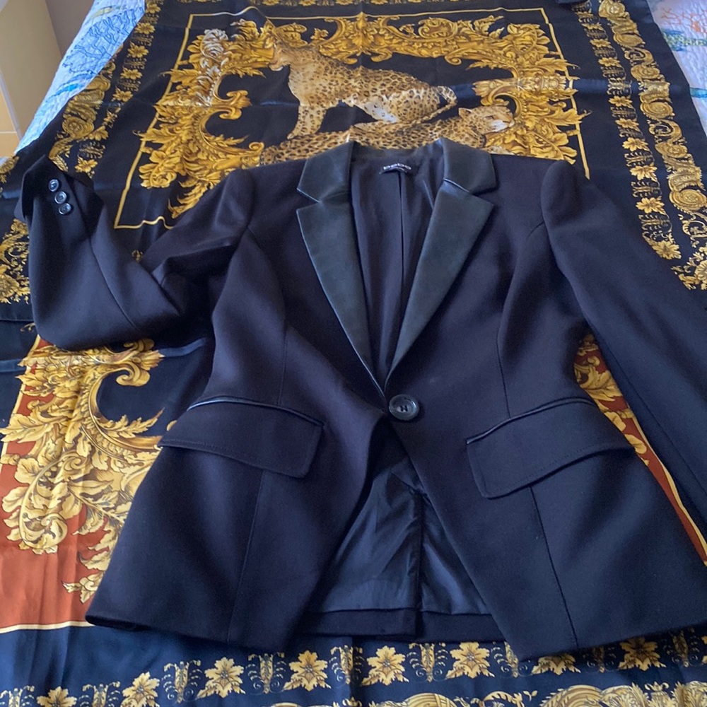 BEBE blazer with faux leather lapel! Classic fit looks rich and chic!